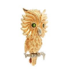 Spilla a forma di gufo in oro giallo e bianco 14kt