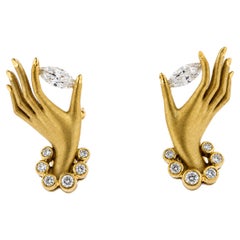 Cellini Hand Holding Marquise Diamond Earrings