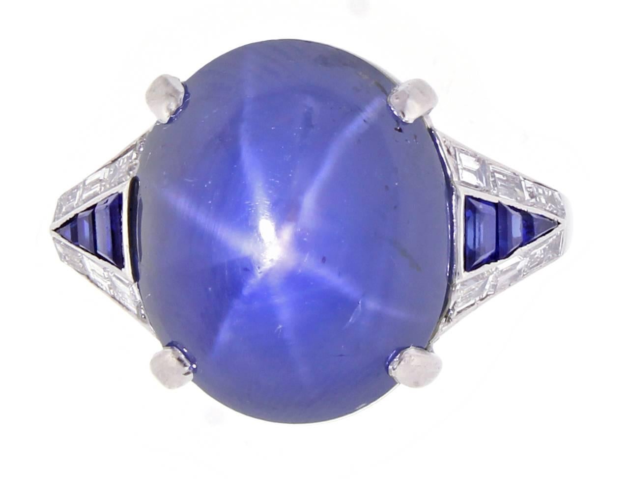 An incredible Art Deco Star sapphire ring from the New York jeweler Paul Gillot & Co. The central Star Sapphire weighs 24.02 carats and is accompanied by A.G.L certificate stating no heat enhancement and the country of origin is Sri