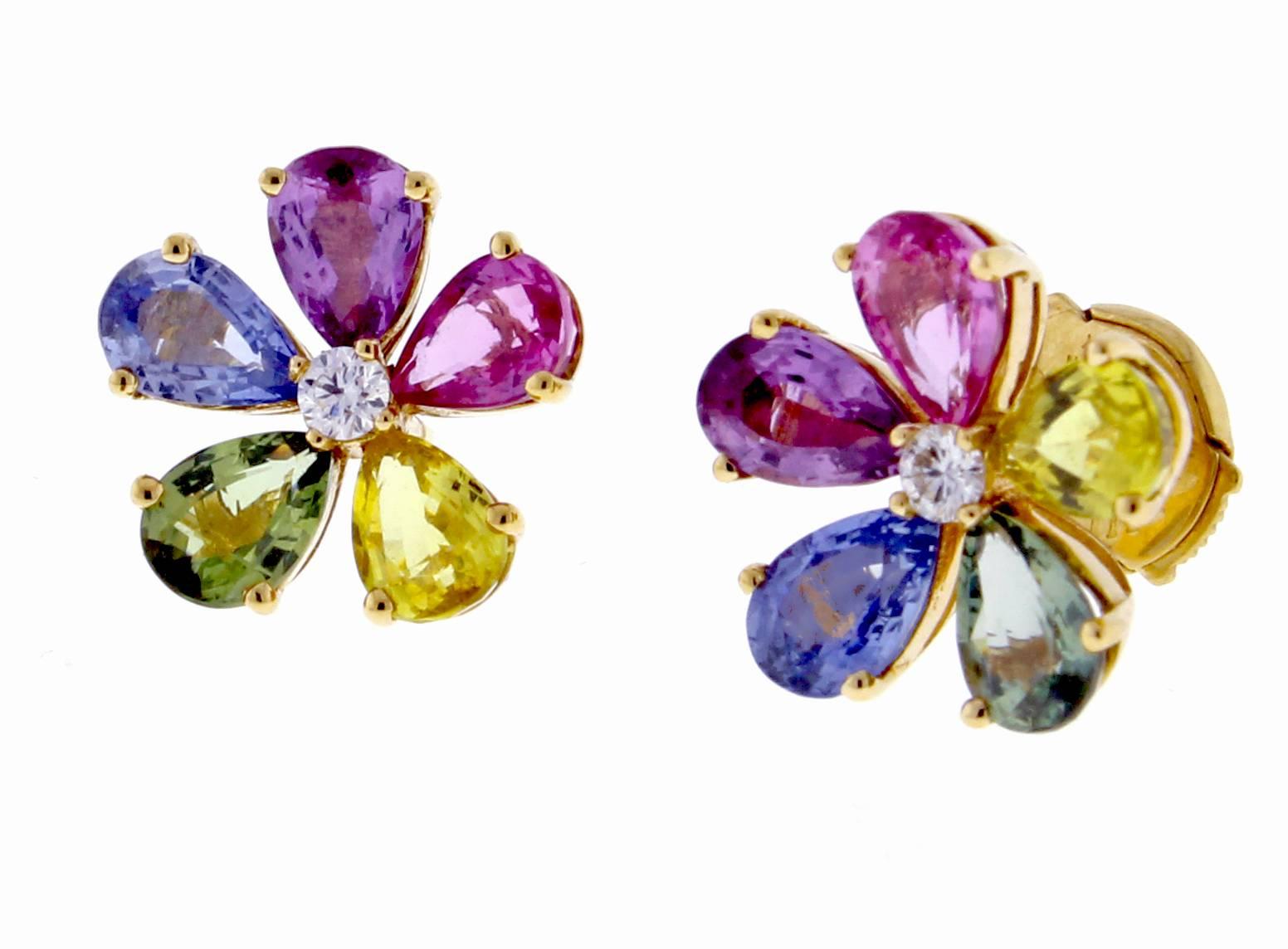 From Bulgari, a pair of flora stud earrings in 18 karat gold with fancy colored sapphires and diamonds. ½ inch