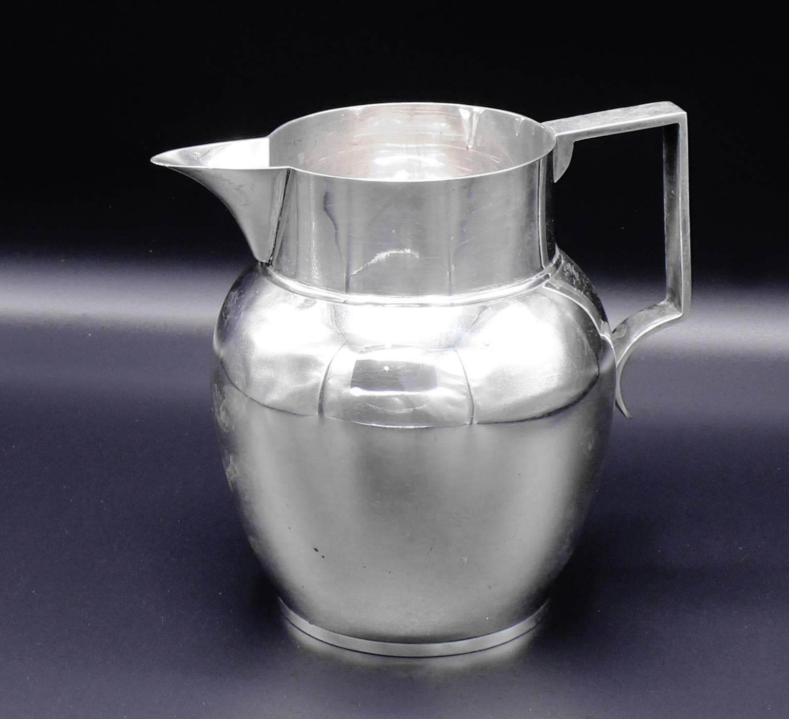From Tiffany & Co Makers this exquiaite water pitcher. Faithfully reproduced from the W. S. Pelletrau original 1810 design. The classic lines and understated architecture make this item w wonderfull edition to any collection. Sterling silver,  