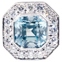 2.04 Carat Light Blue Aquamarine and Diamond 18 Carat Gold Halo Cluster Ring