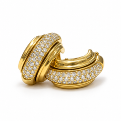 Boucles d'oreilles créoles « Possession » Piaget, ornées de diamants, en or jaune 18 carats, signées