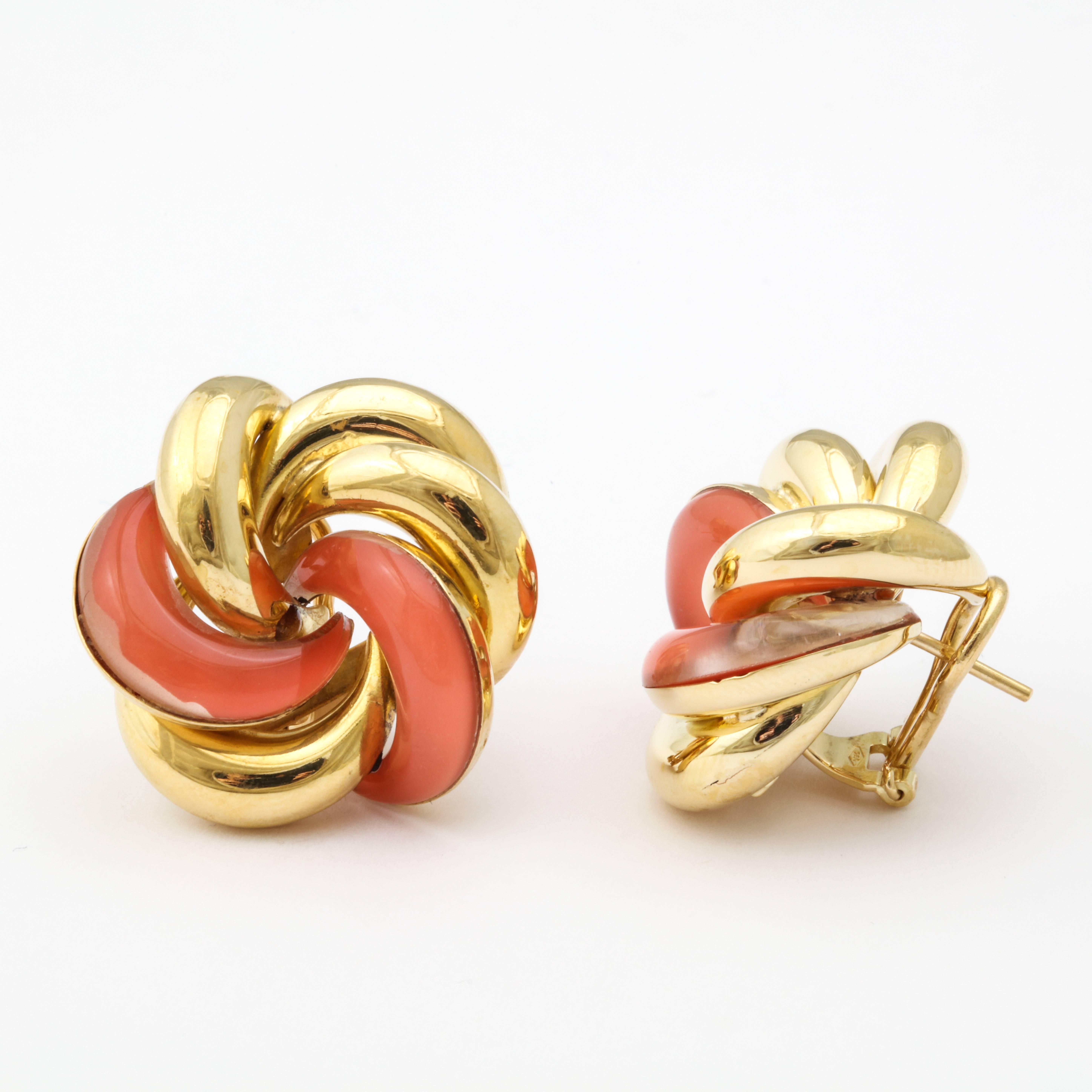 18k Italian yellow gold earrings set with coral stones.