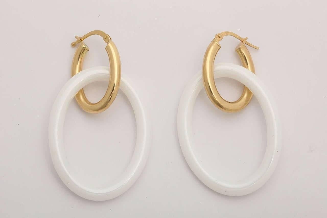 18k yellow gold earrings with white ceramic links.