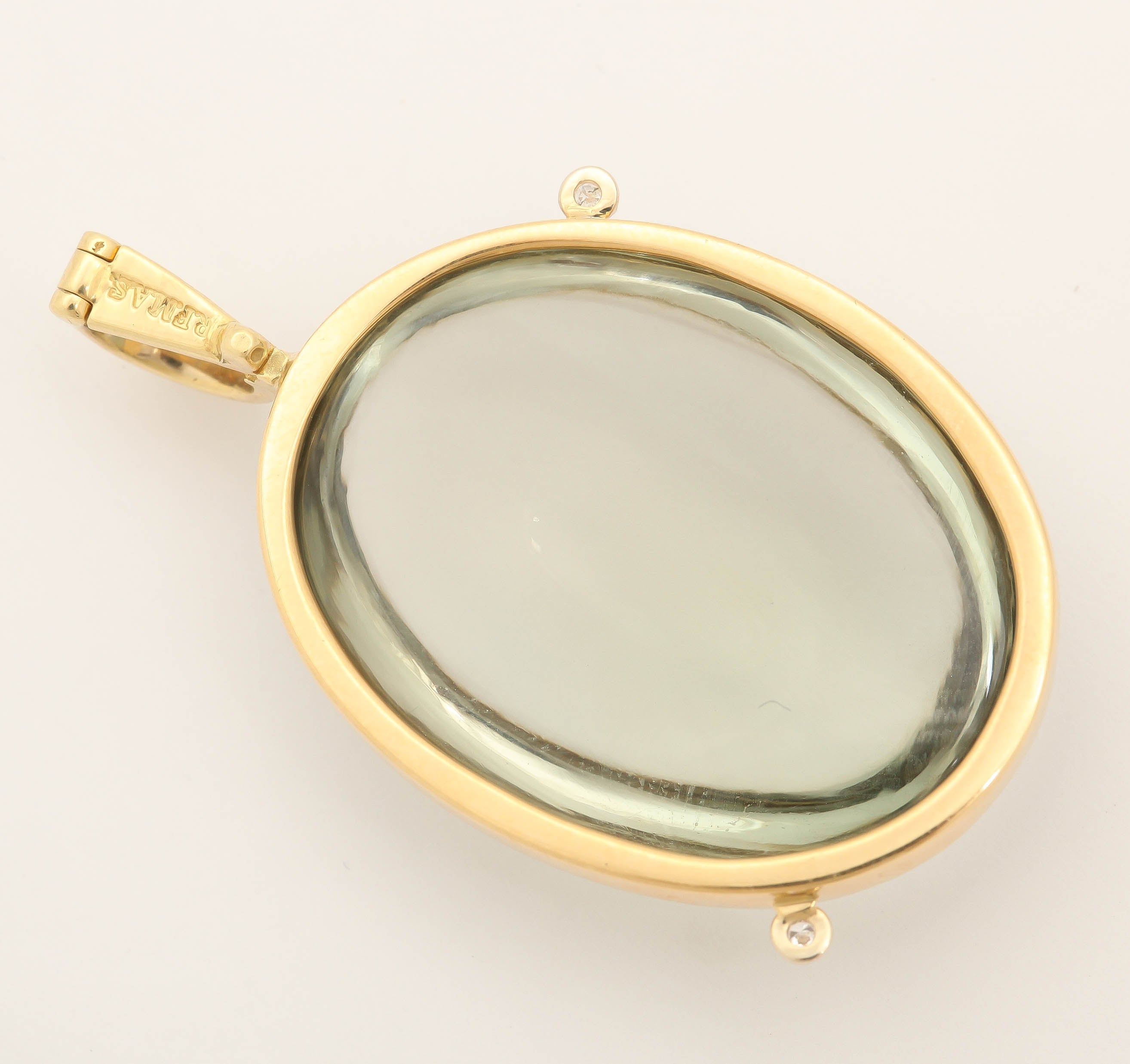 18K yellow gold green amethyst pendant with 0.02ct diamonds.