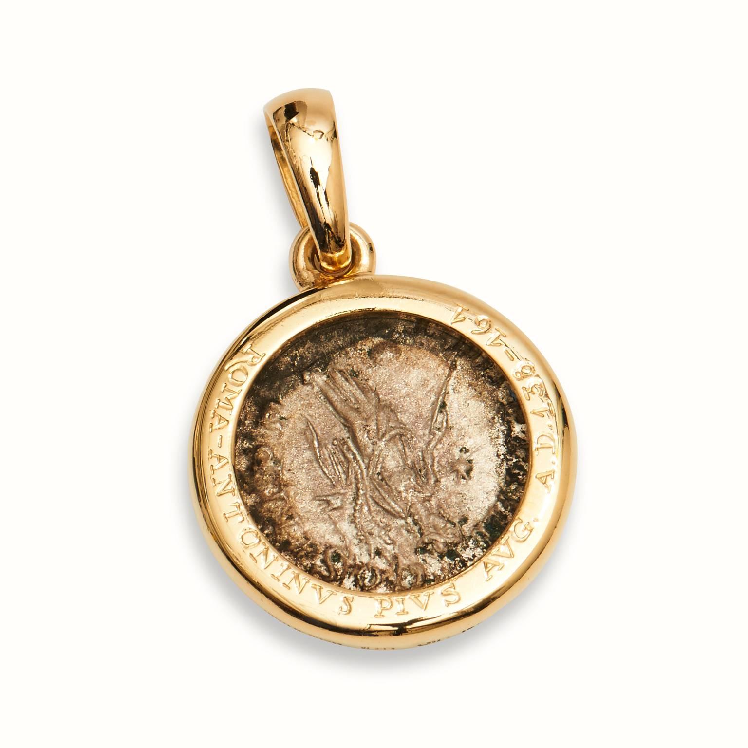 This Bvlgari coin pendant is crafted in 18kt yellow gold. New list retail price is $3,600. Our price $2,400