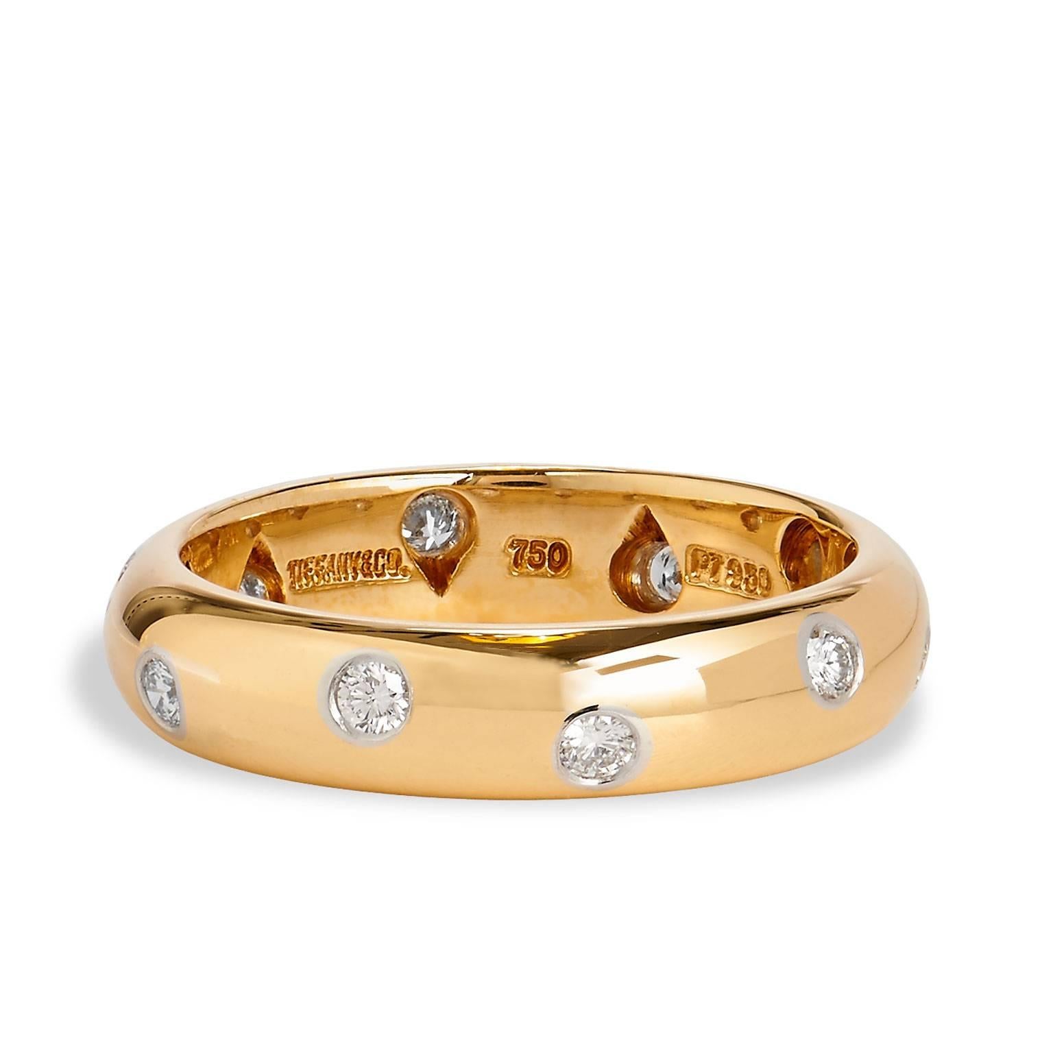 Show your love with this stunning authentic Etoile band ring from Tiffany & Co! This beautiful 18K Yellow Gold Ring has ten brilliant white Diamonds weighing 0.22ct Color: F/G Clarity: VS1 set in Platinum heads. This Gorgeous ring is a 5.5 and is