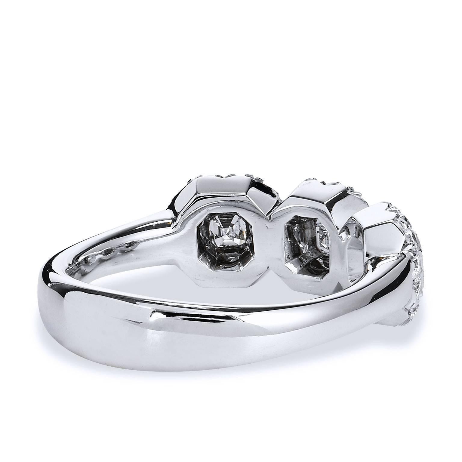Women's 3 Fine Diamonds Set in a Pave Diamond 18kt White Gold Ring