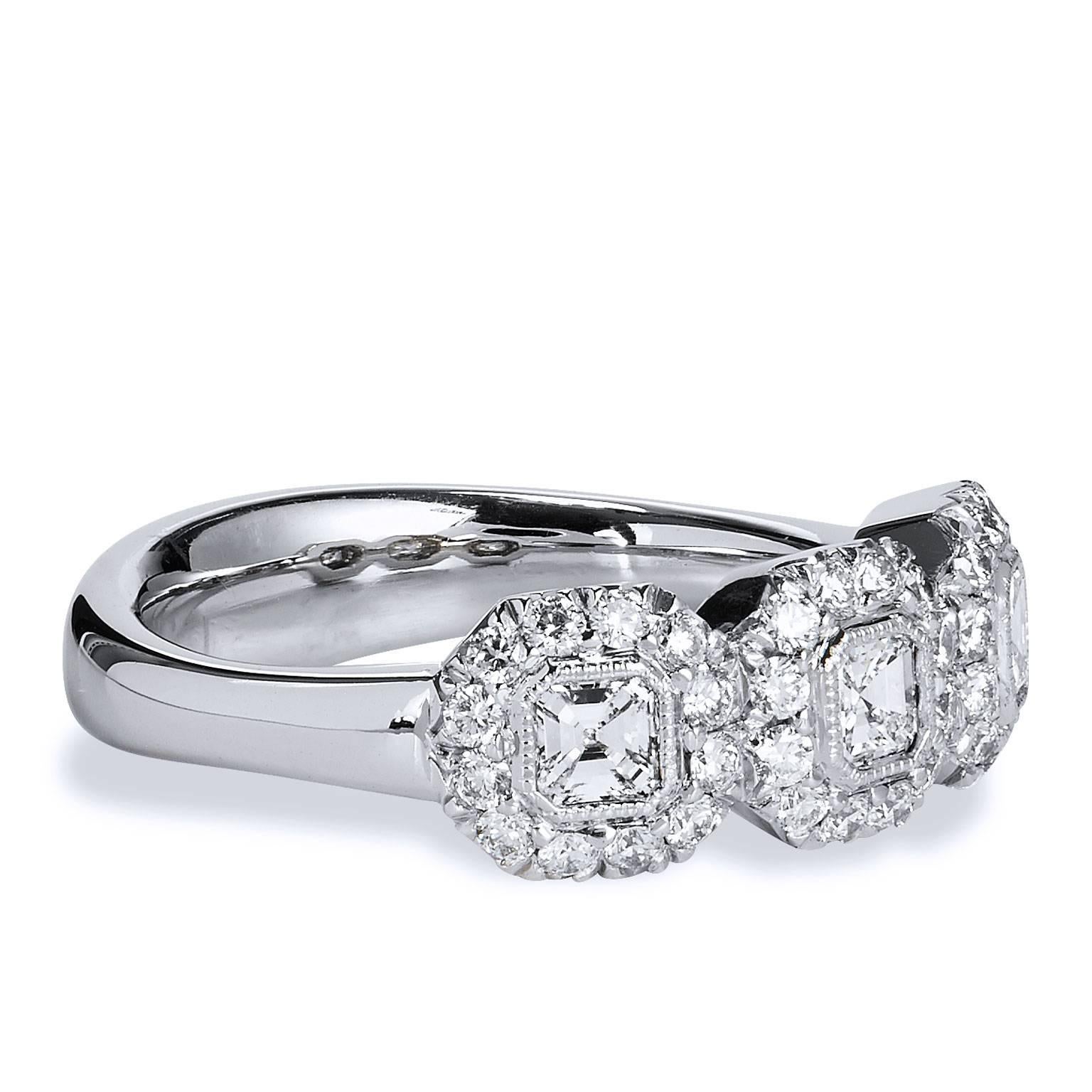 Emerald Cut 3 Fine Diamonds Set in a Pave Diamond 18kt White Gold Ring