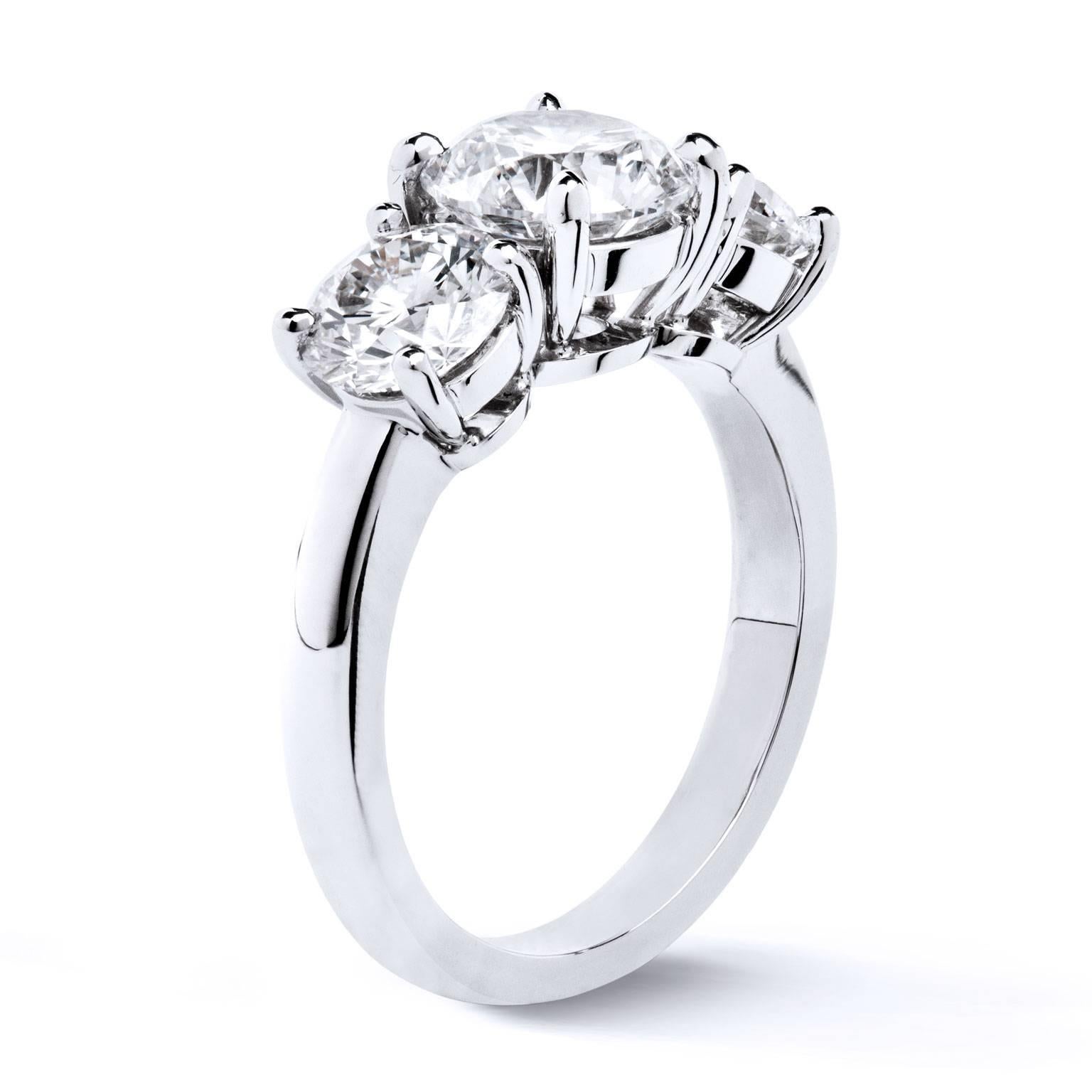 Round Brilliant Cut GIA Cert Diamonds High Polished Platinum Three Stone Ring In Excellent Condition In Miami, FL