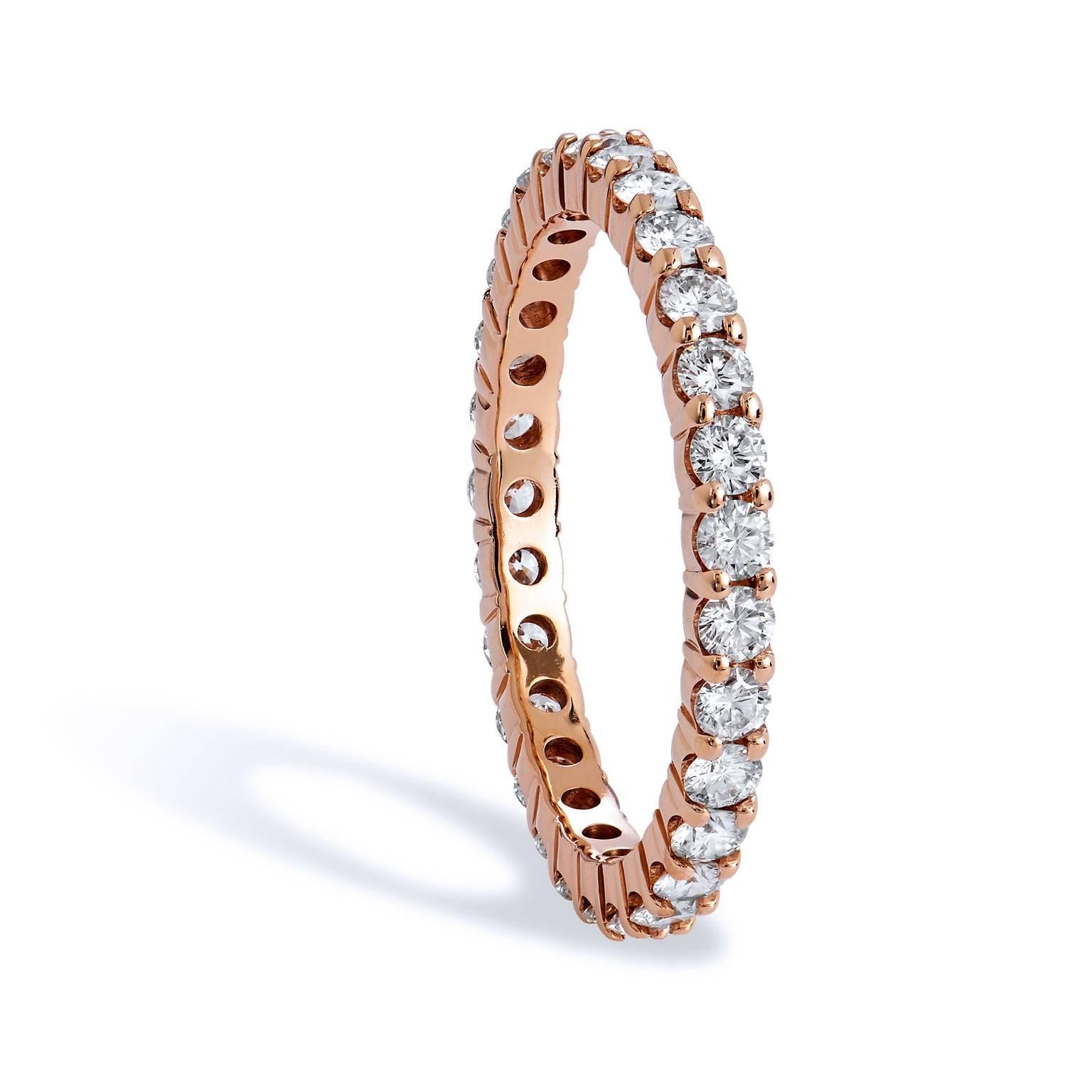 One Carat Diamond Eternity Rose Gold Band

This beautiful eternity band has 29 round brilliant cut diamonds.  It is a total of one carat total weight.   The entire band is made with 18 karat rose gold with the diamonds sharing the prongs. 

The