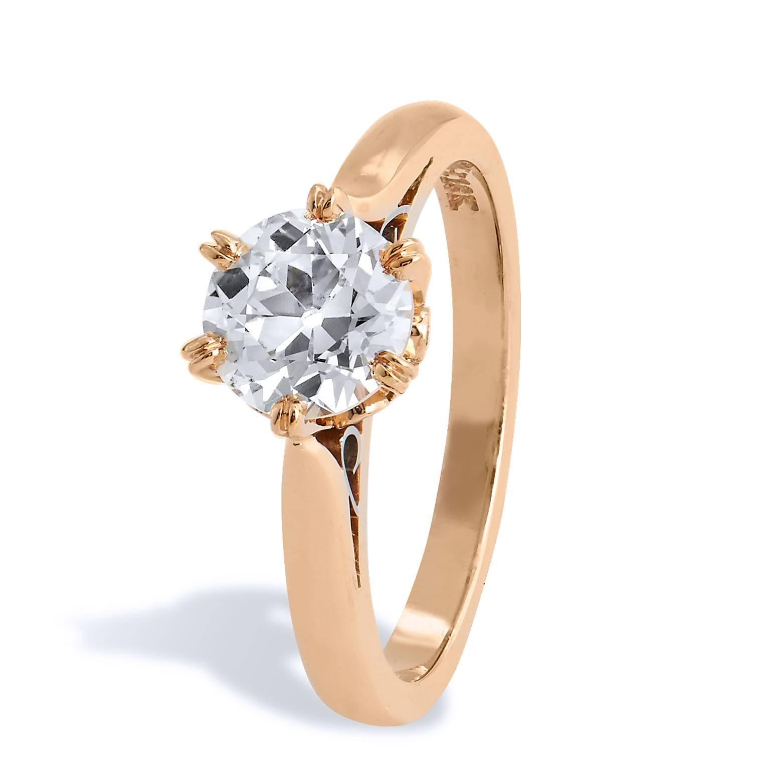 18 karat rose gold makes a statement in this 1.04 carat Old European cut diamond (M/SI2; GIA #6157638684) solitaire engagement ring. To further enhance the charm and dainty quality of this ring are filigree work and six pieces of diamonds with a