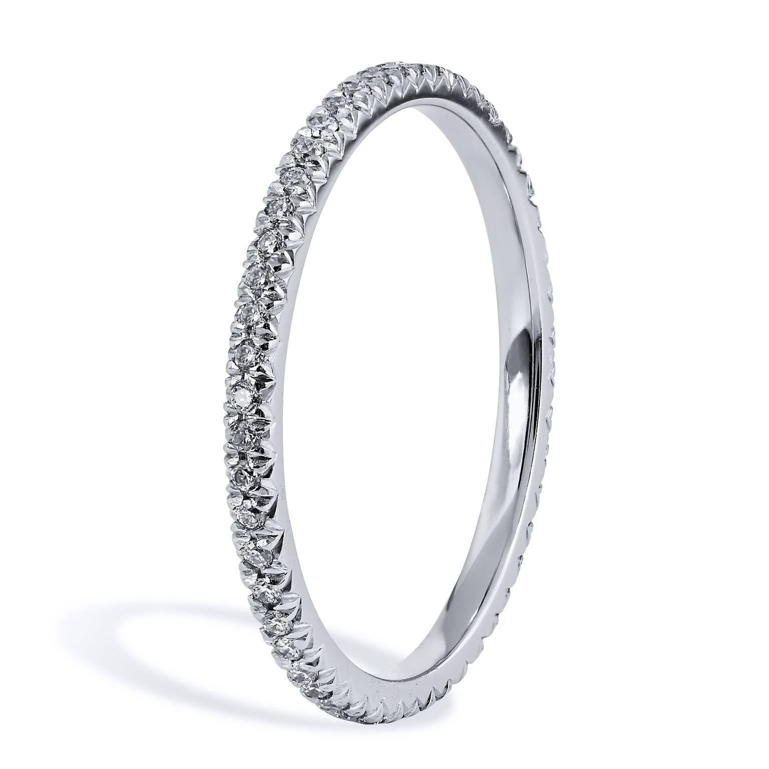 This diamond band ring features fifty-one pieces of diamond pave set with a total weight of 0.20 carat (G/H/VS). Affixed to a 1.5 mm platinum band, the split V detail, opens the eye, allows the ring to pop with light.