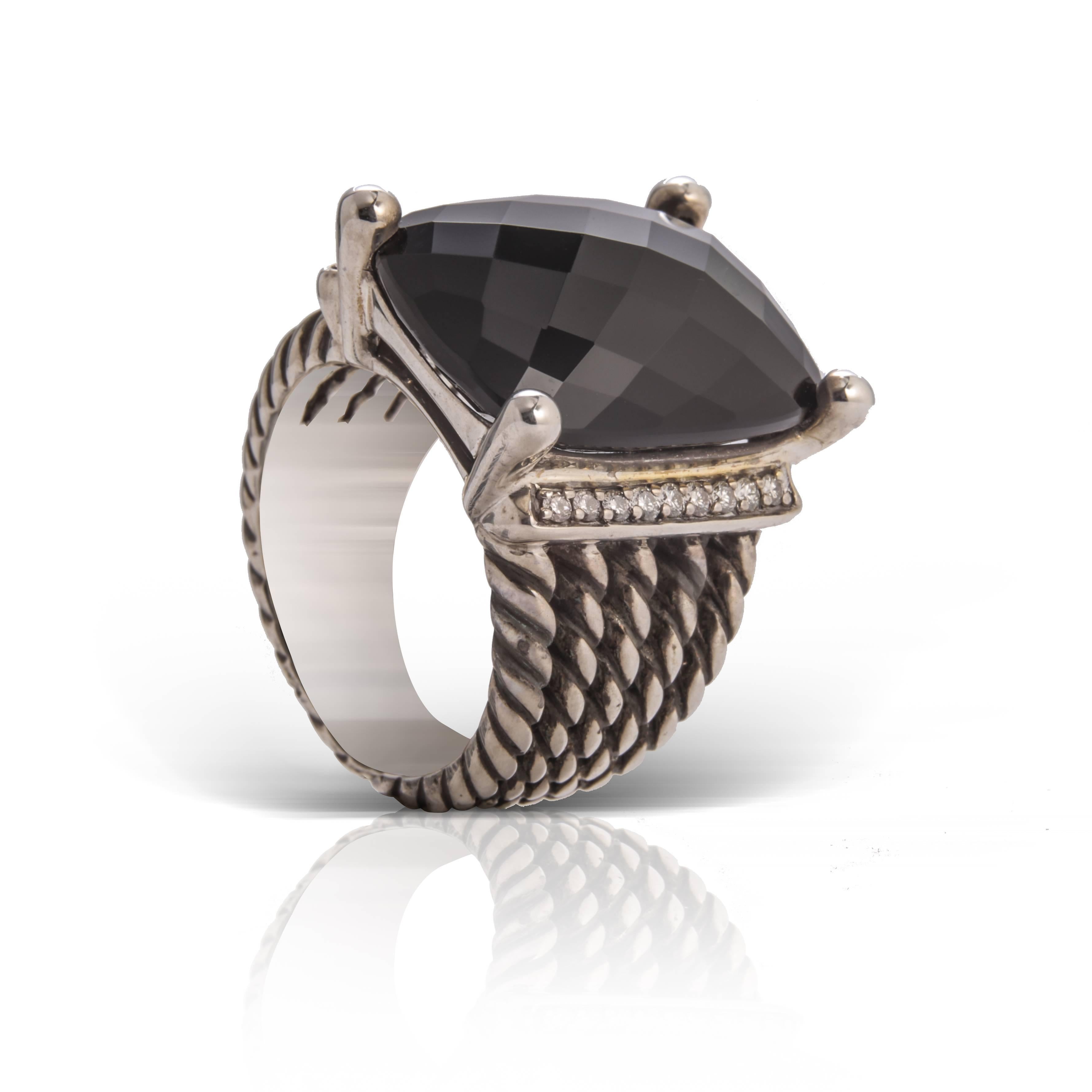 Previously loved sterling silver David Yurman Wheaton ring featuring black onyx with 0.23 carat of diamonds pave set at each side in white gold and split cable shank (size 7).

