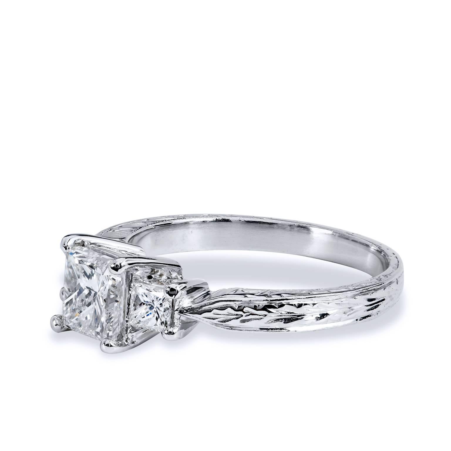 GIA Certified 1.26 Carat Diamond Three Stone Princess Cut Engagement Ring Size 7

This estate spectacular three-diamond platinum engagement ring features a 1.00 carat Princess cut diamond affixed at center (L/VS2; GIA #5171155030) with two 0.26
