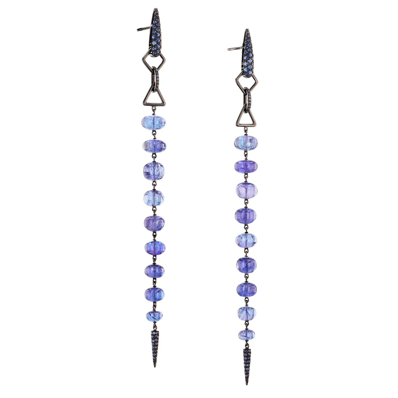 48.48 ct Blue Tanzanite & Sapphire 18 kt Yellow Gold with Black Rhodium Earrings

These trend setting 18 karat yellow gold black rhodium plated earrings are adorned with blue sapphires (1.12 carats in total weight), complimenting a length of