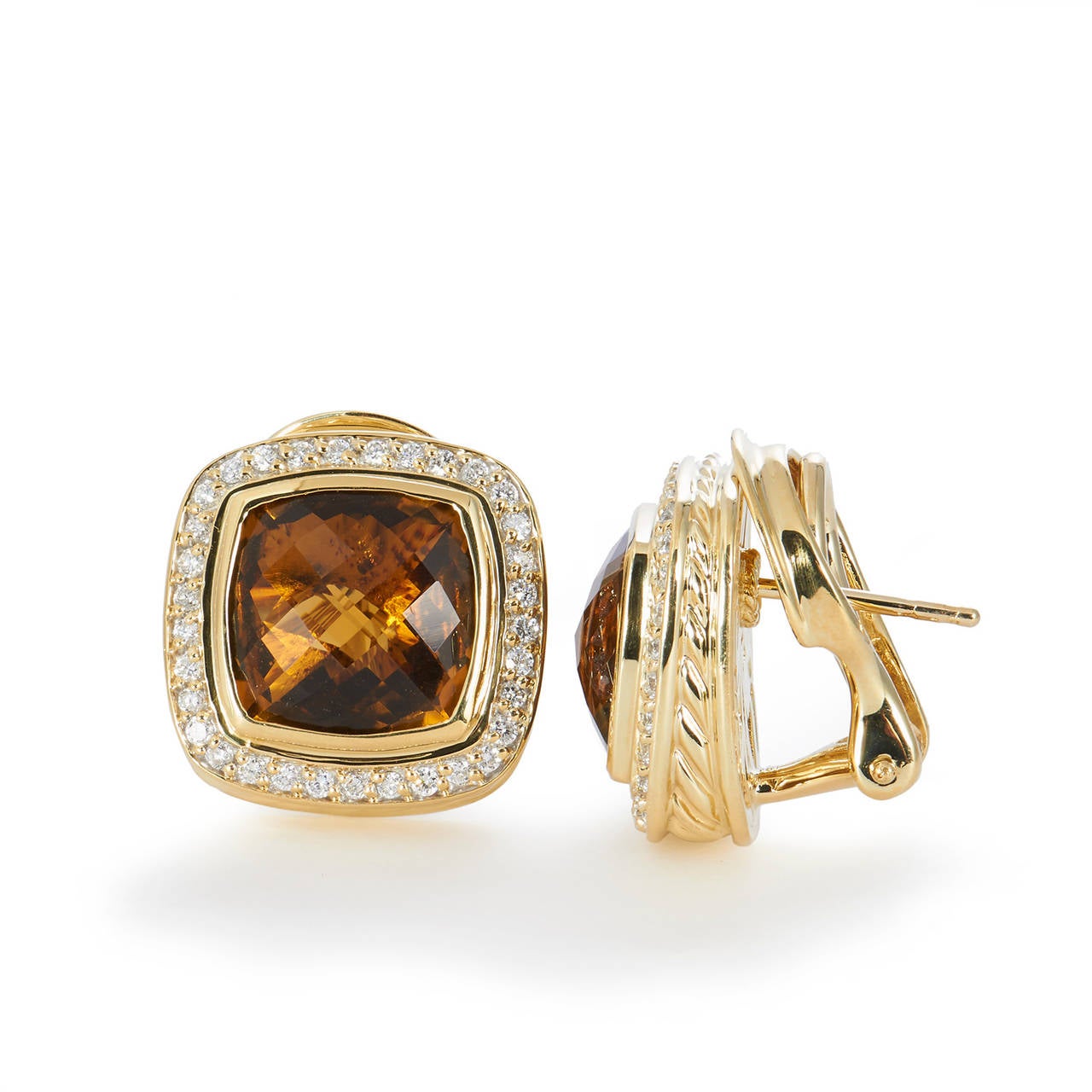 This stunning and sophisticated pair of earrings are a part the most recognized and iconic designs of David Yurman, the Albion collection. Crafted in 18K yellow gold, the set displays approximately 11 mm of checkerboard cushion cut Citrine as the