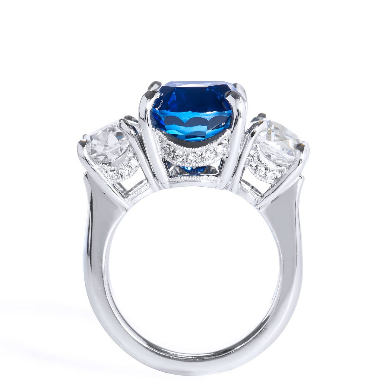GIA Cert 10.16 Carat Vivid Blue Sapphire and Diamond Platinum Ring Size 5.5

Throughout history, the sapphire has symbolized truth, sincerity and loyalty; and thought to bring peace, joy and wisdom to its wearer. These characteristics combined with