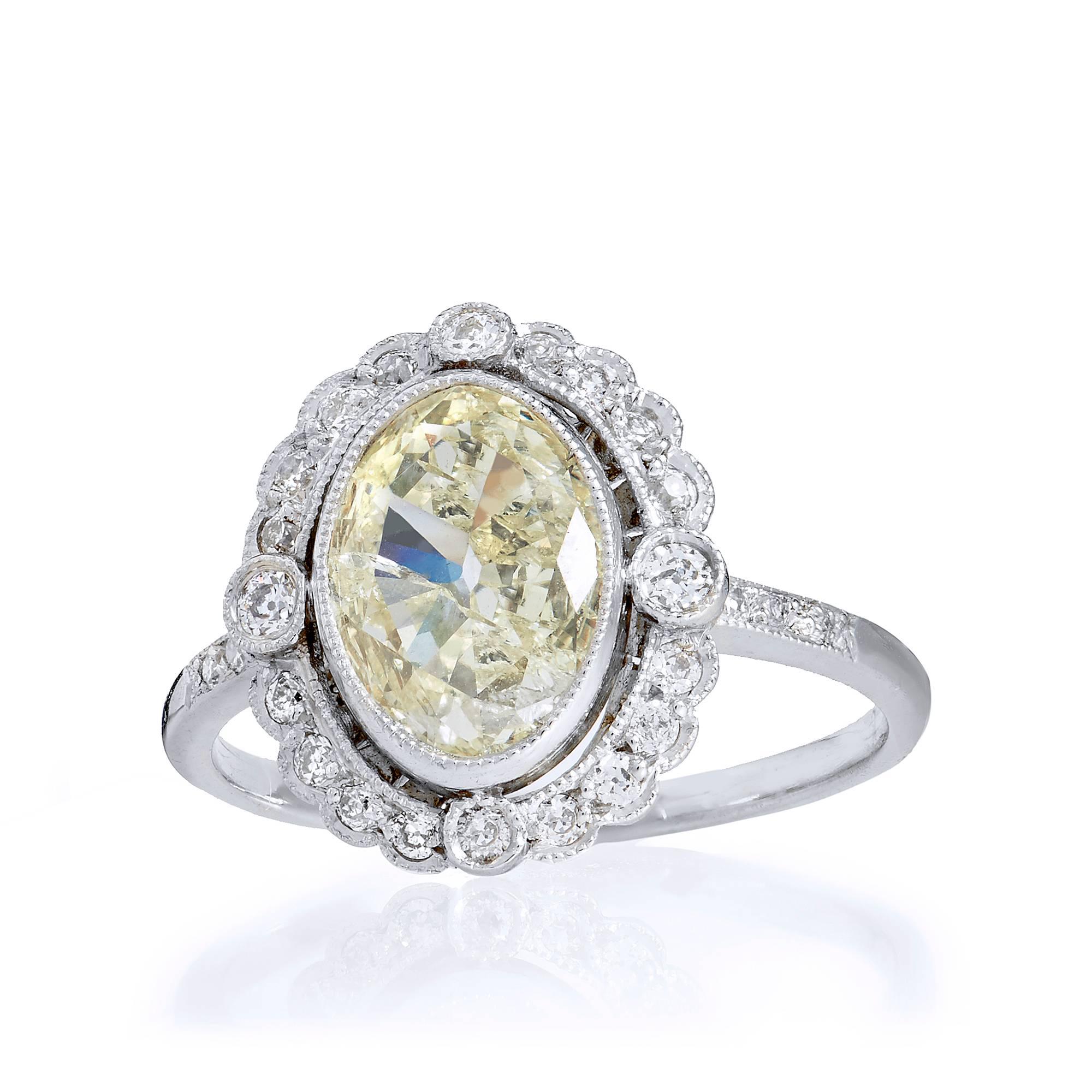 Oval Cut GIA 1.26 Carat Natural Light Yellow Diamond Platinum Engagement Ring 6.25