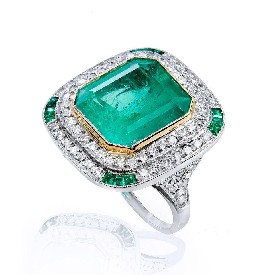 7.44 Carat Colombian Emerald 18 karat White Gold & Platinum Cocktail Ring 

This is a one of a kind, handmade ring. We have used the stunning antique emerald to create this Art Deco Style ring. 

The allure of the Emerald has tantalized cultures for