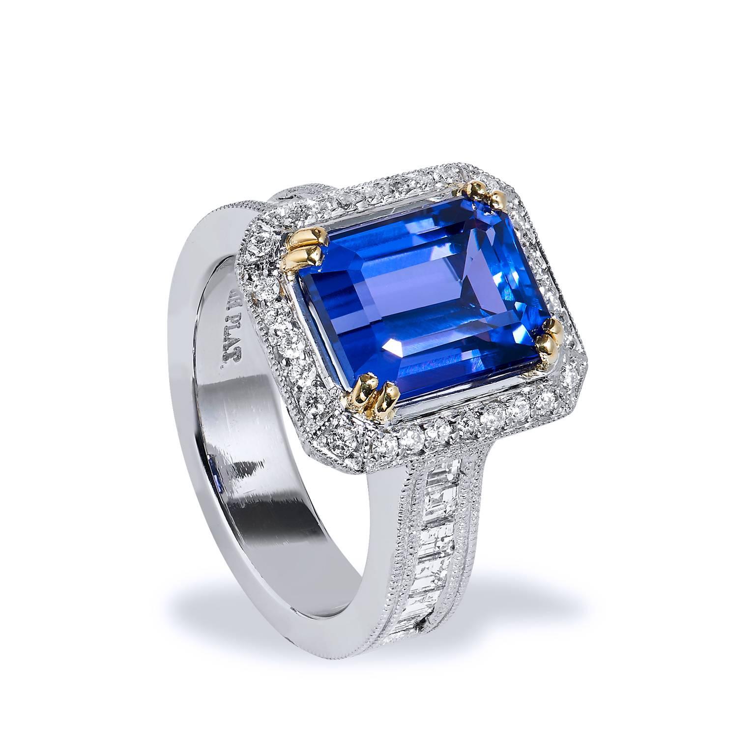 Art Deco Inspired 4.91 Carat Tanzanite & Diamond Platinum & 18 Kt Gold Ring

A captivating 4.91ct deep purplish blue tanzanite stone takes center stage of this handmade Art Deco Style ring, by H&H Jewels. This ring is meticulously crafted in