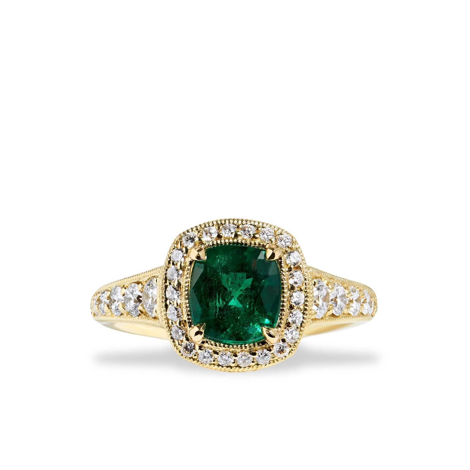 GIA Certified 1.18 carat No Treatment Emerald and Diamond Halo 18 karat Yellow Gold 

Unique is the true definition of this piece. A one-of-a- kind, handmade by H&H Jewels, this is truly a show stopping design.  
This ring is crafted in 18 karat