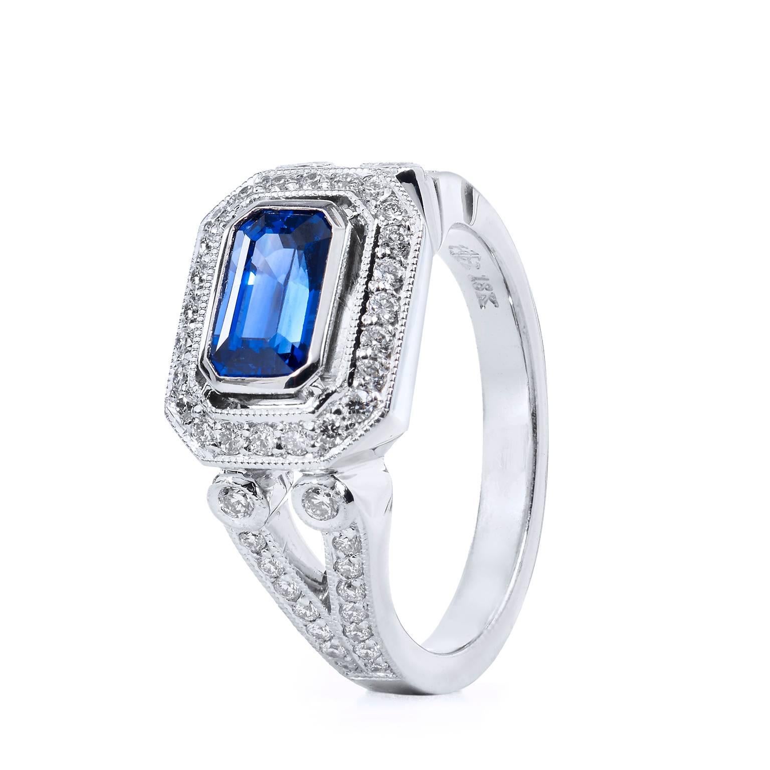 1.35 ct Vivid Blue Madagascar Sapphire & Diamond 18 karat Gold & Palladium Ring

This stunning ring is a handcrafted and one of a kind, made by H&H Jewels.  It is forged in 18 karat gold & palladium, this ring features a vivid blue Madagascar