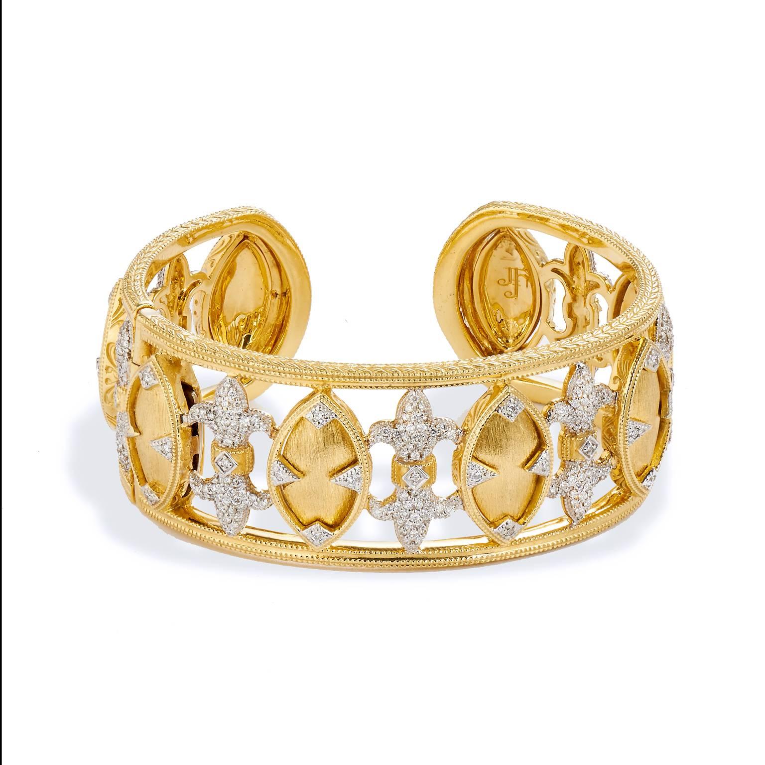 Combining classic elegance with on trend shapes and styles, Jude Frances Jewelry, is a much desired designer. This bracelet features a beautifully feminine Marquis Fleur Cuff design crafted in 18kt yellow gold and 2.28ct of diamond pave.