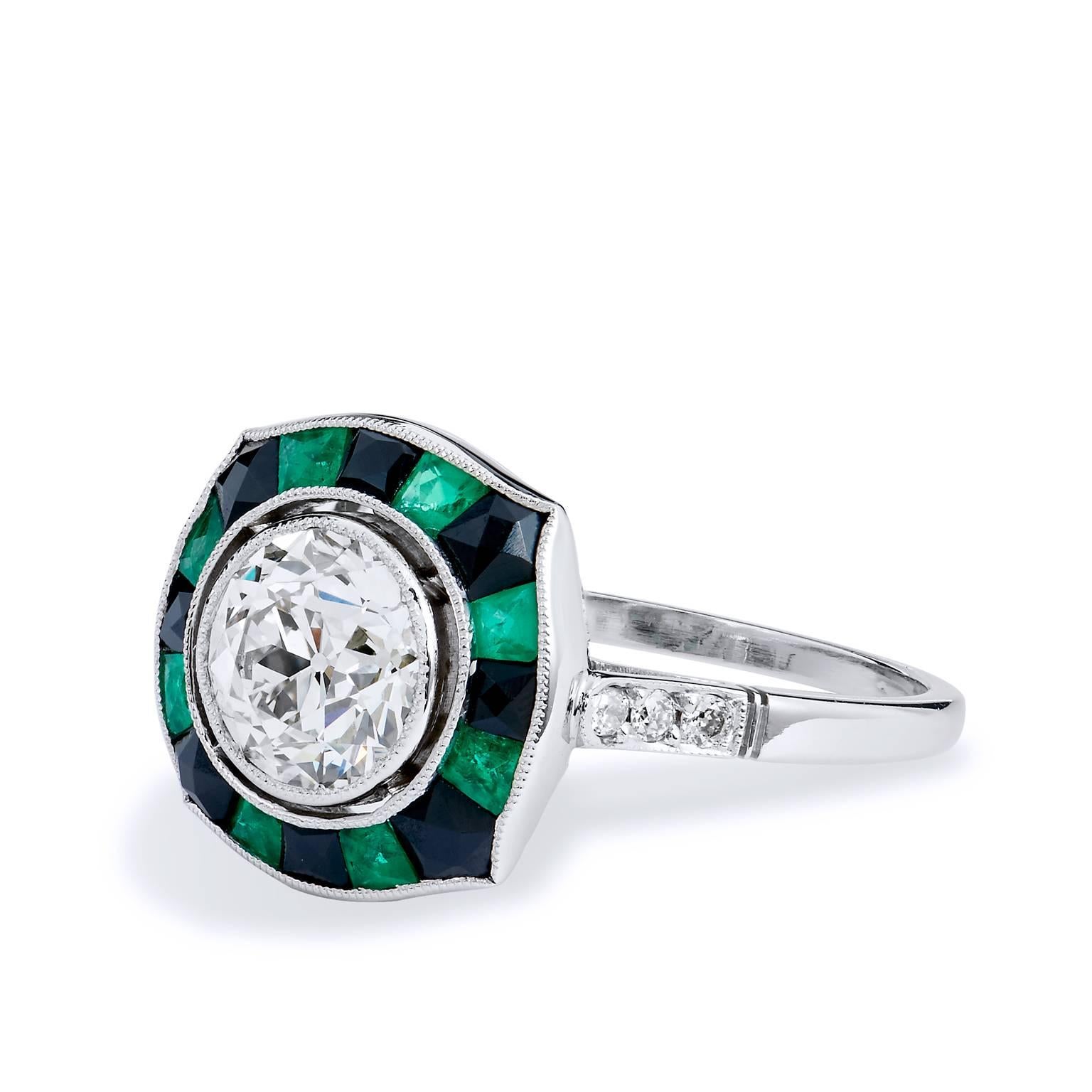 Art Deco Style Old European Cut Diamond Black Onyx Emerald Platinum Ring
Crafted in platinum, this ring features a GIA certified 1.25ct Old European cut diamond in the center graded L-VS1. Bold and beautiful, the contrast of diamonds, emeralds and