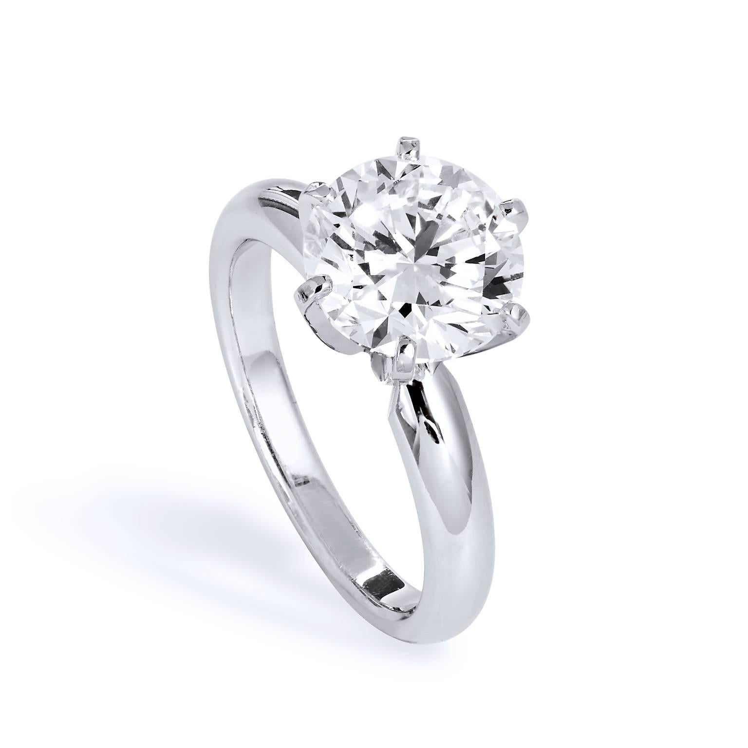 GIA Certified 3.04 Carat Diamond Platinum 4 Prong Solitaire Engagement Ring

Breathtaking natural beauty defines this gorgeous ring with its timeless design and its quality grade color and clarity. 
Handmade in platinum, this ring features a 3.04ct
