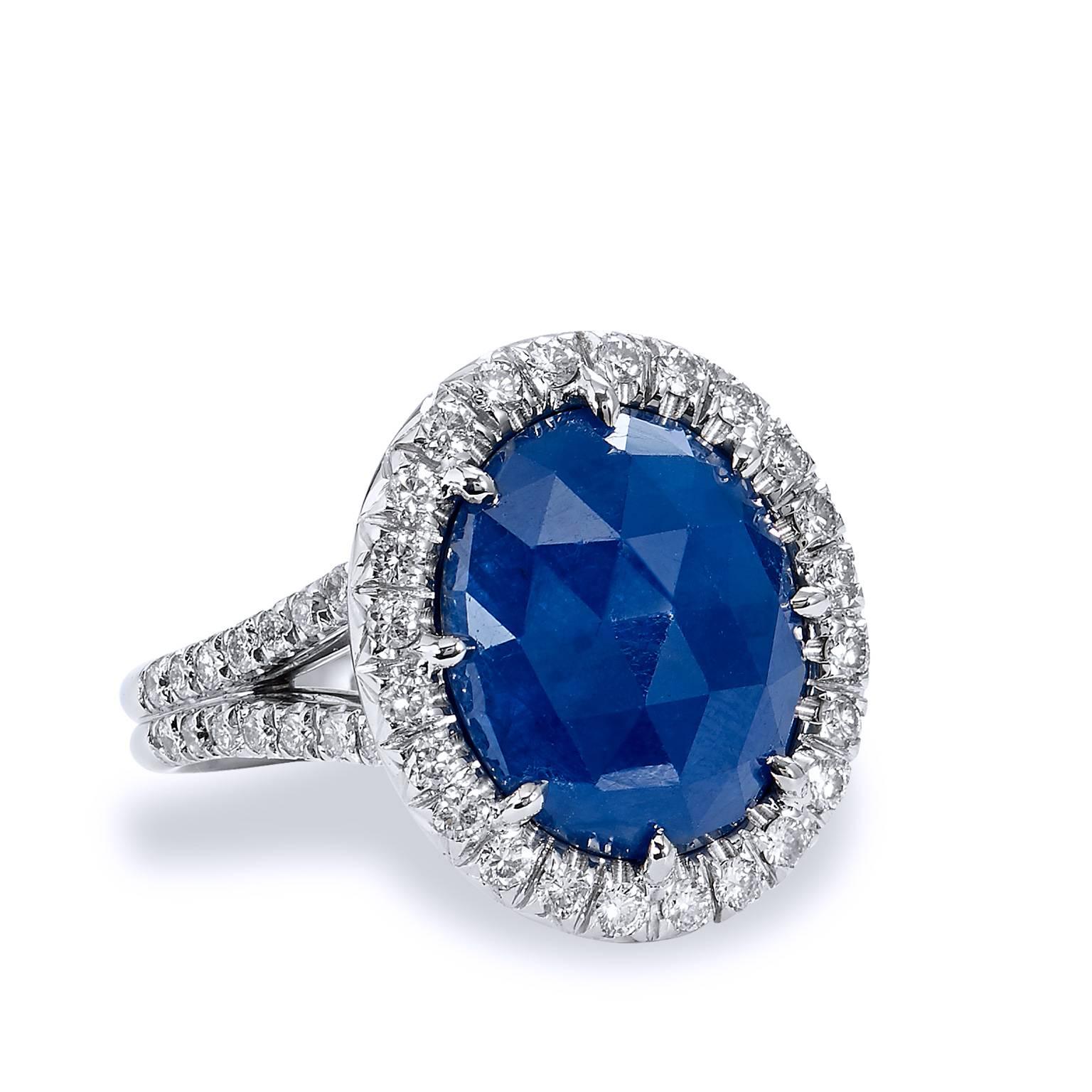 5.59 Carat No Heat Blue Sapphire and Diamond 18 karat Gold Ring Size 6.25

This is handcrafted by H&H Jewels, in 18 kt white gold, this stunning cocktail ring features an impressive 5.59 carat no heat rose cut blue sapphire. 
The sapphire is