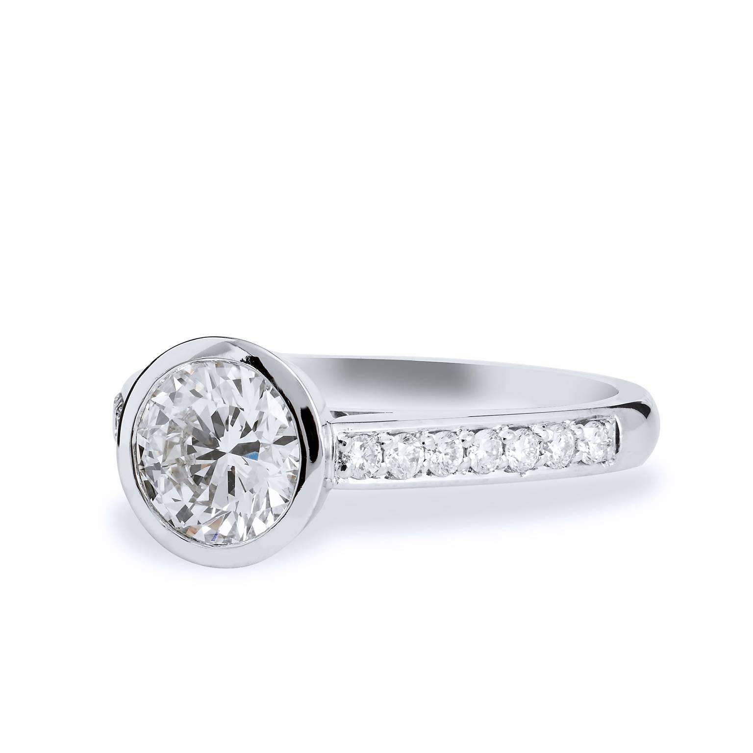 GIA Certified 1.01 carat Diamond and Pave Bezel Set Platinum Engagement Ring

This is a one of a kind, handmade ring by H&H Jewels.  
It features a 1.76 carat Bezel Set Diamond with Pave & Marquis diamonds set in Platinum 

Make a simple, elegant