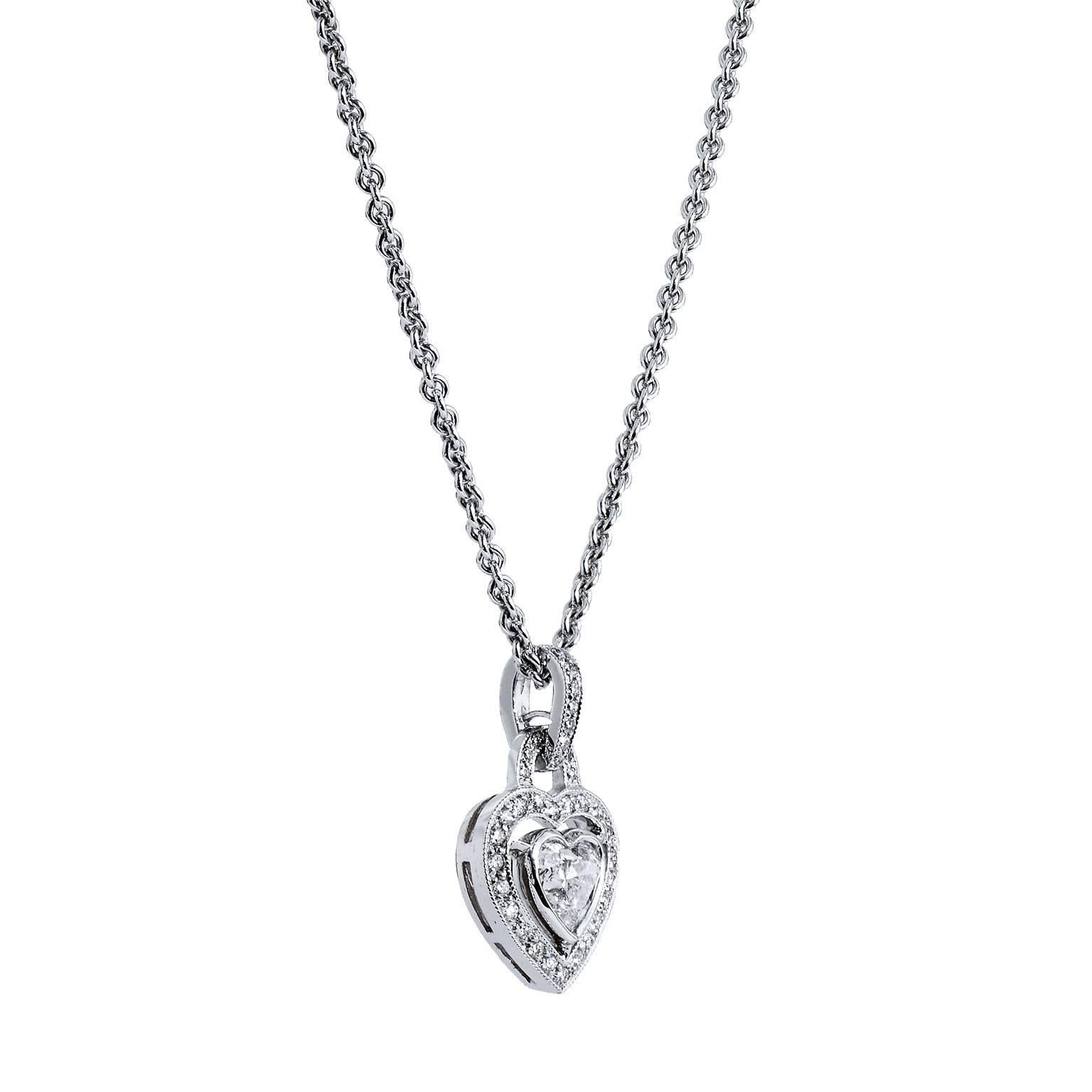 The heart, a symbol of not only deep love and affection but also, the beauty that lies at the core of one’s being. Let this handmade pendant exemplify your presence.  Thirty-six pieces of diamonds, weighing 0.19 carats, are pave set around an 18