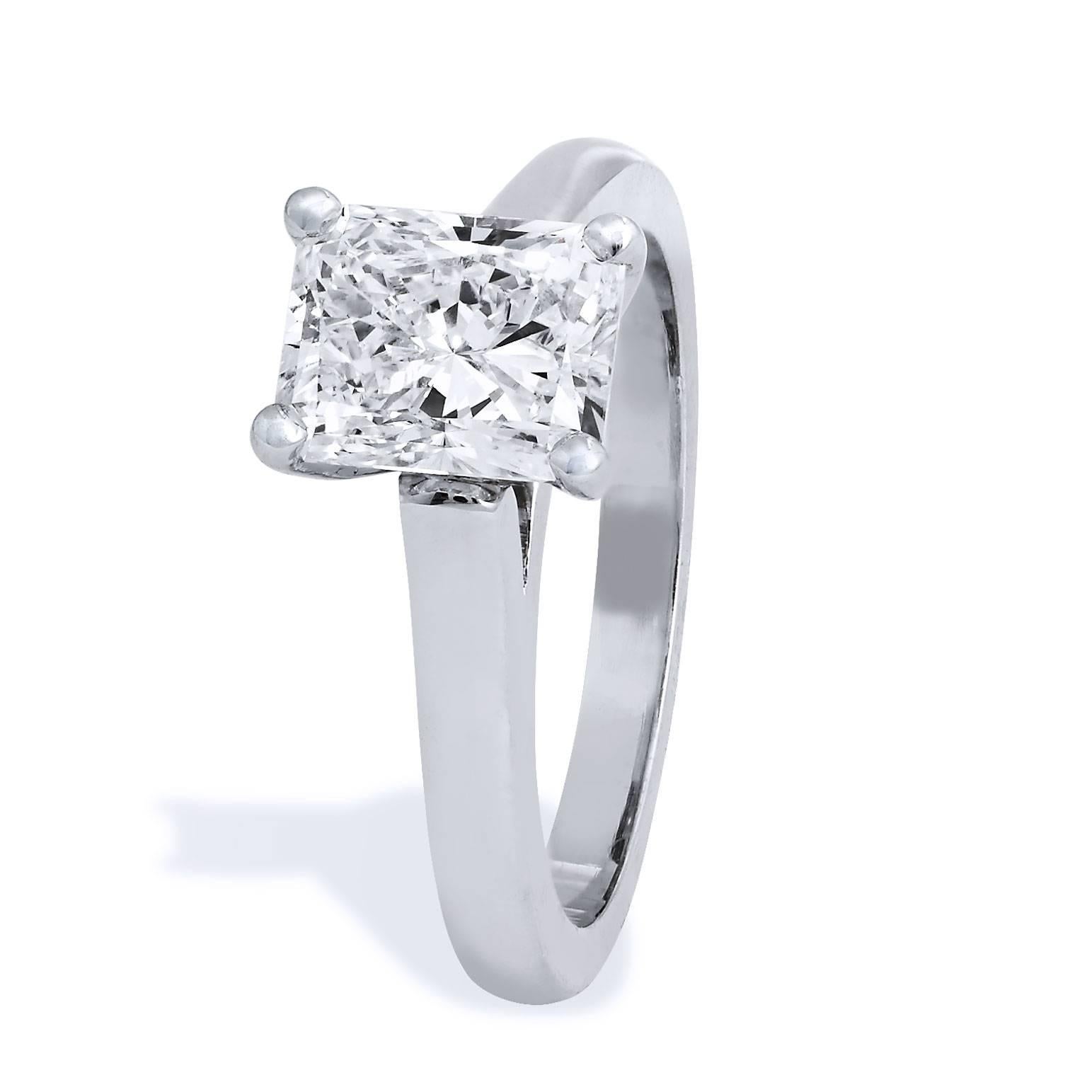 The chic rectangle shape and gently trimmed corners of this 1.84 carat radiant cut diamond engagement ring bursts like a shooting star on the traditional flat shank in platinum (GIA #15786162). F in color and SI2 in clarity, your bride-to-be will be