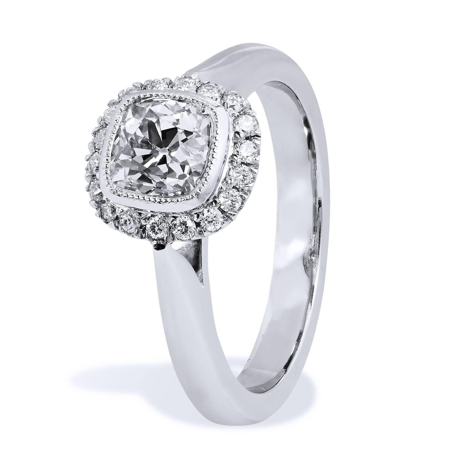 GIA Certified 1.04 Carat Antique Cushion Cut Diamond Engagement Ring with Halo

This 18 karat white gold with palladium engagement ring features a 1.04 carat antique cushion cut diamond (J/SI2; GIA#1156969078) in bezel set at center with milgrain