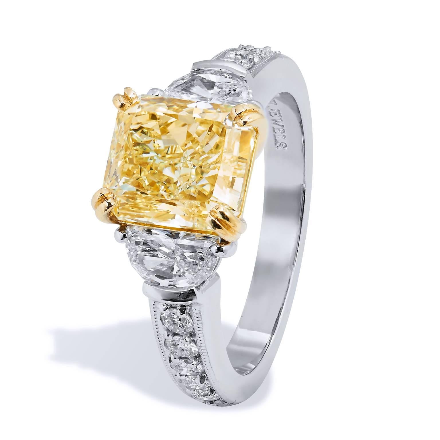 GIA Certified 3.17 Carat Fancy Yellow and Half Moon-Shaped Diamond Engagement Ring

Handmade by H&H Jewels this ring is a luminous, awe-inspiring 3.17 carat fancy yellow diamond set at center ( SI1/EX/VG; GIA #517599400), radiates a warmth and