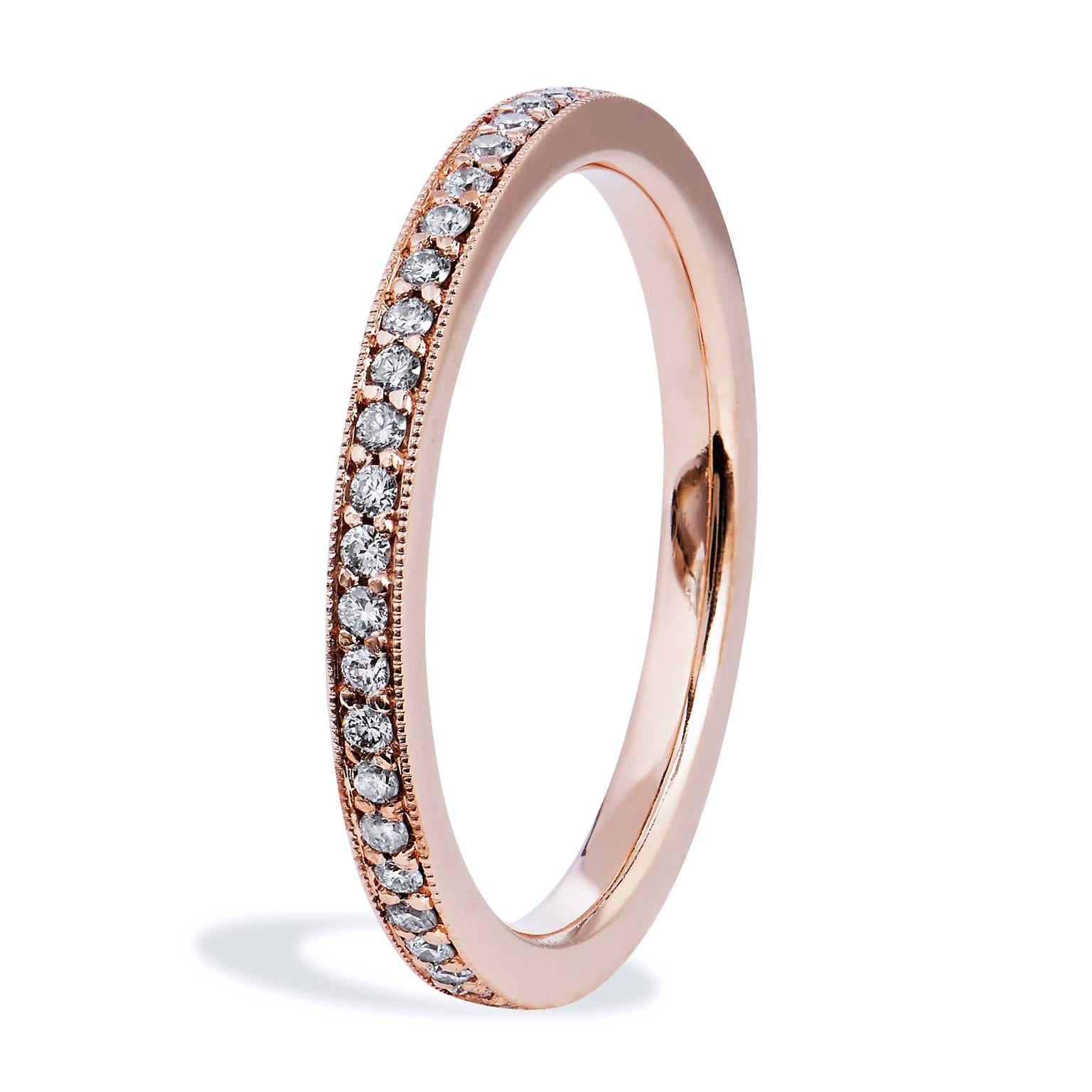 Rose Gold Diamond Eternity Band

Forty-nine pieces of diamonds, with a total weight of 0.33 carat (F/G/VS1), smolder within the warmth of 14 karat rose gold in this 2.00 mm wide eternity band (size: 6.75).