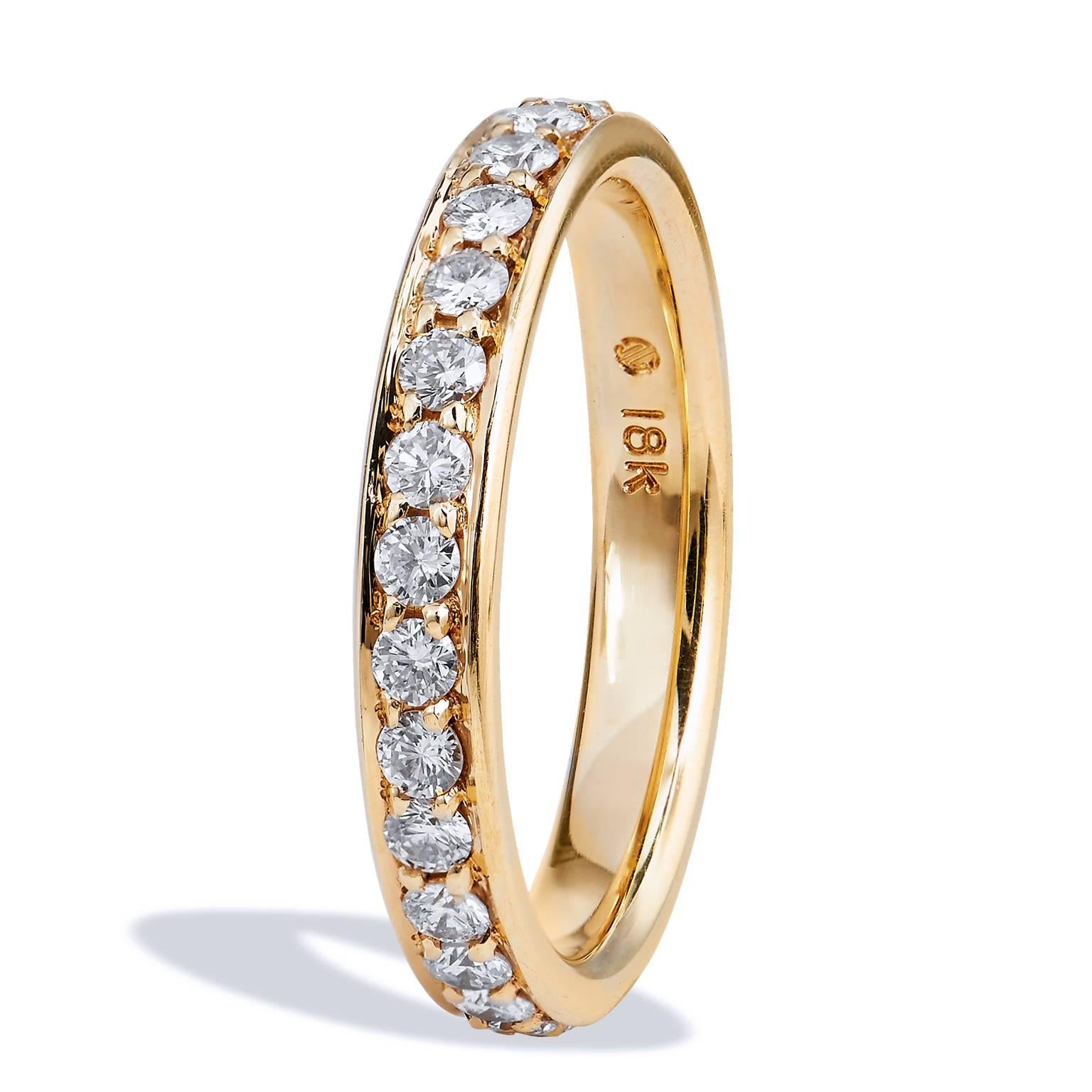 18 Karat Yellow Gold 0.67 Carat Diamond Eternity Wedding Band Ring

This is a one of a kind, handmade ring by H&H Jewels.  This band ring features 0.67 carat of round diamonds (F/G/VS) pave set. Affixed to an 18 karat yellow gold band, this ring