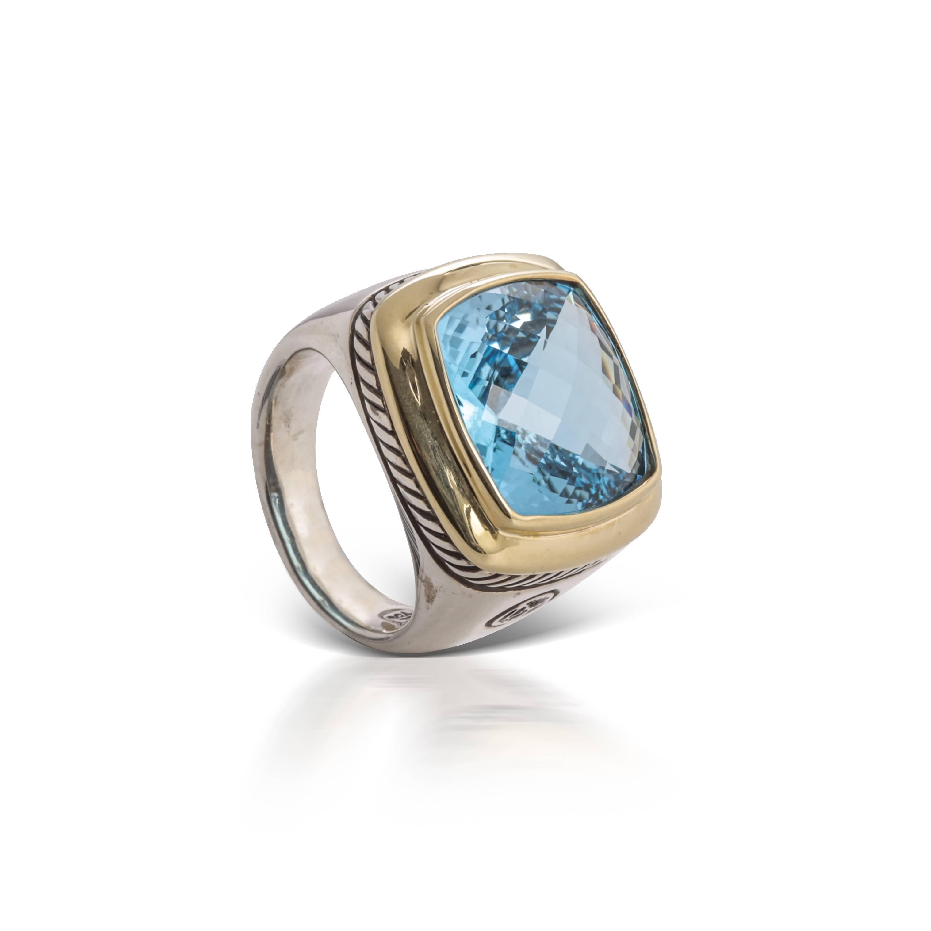 Previously loved sterling silver David Yurman Albion ring featuring a cushion-cut topaz bezel-set at center in 18 karat yellow gold (size 7.5).