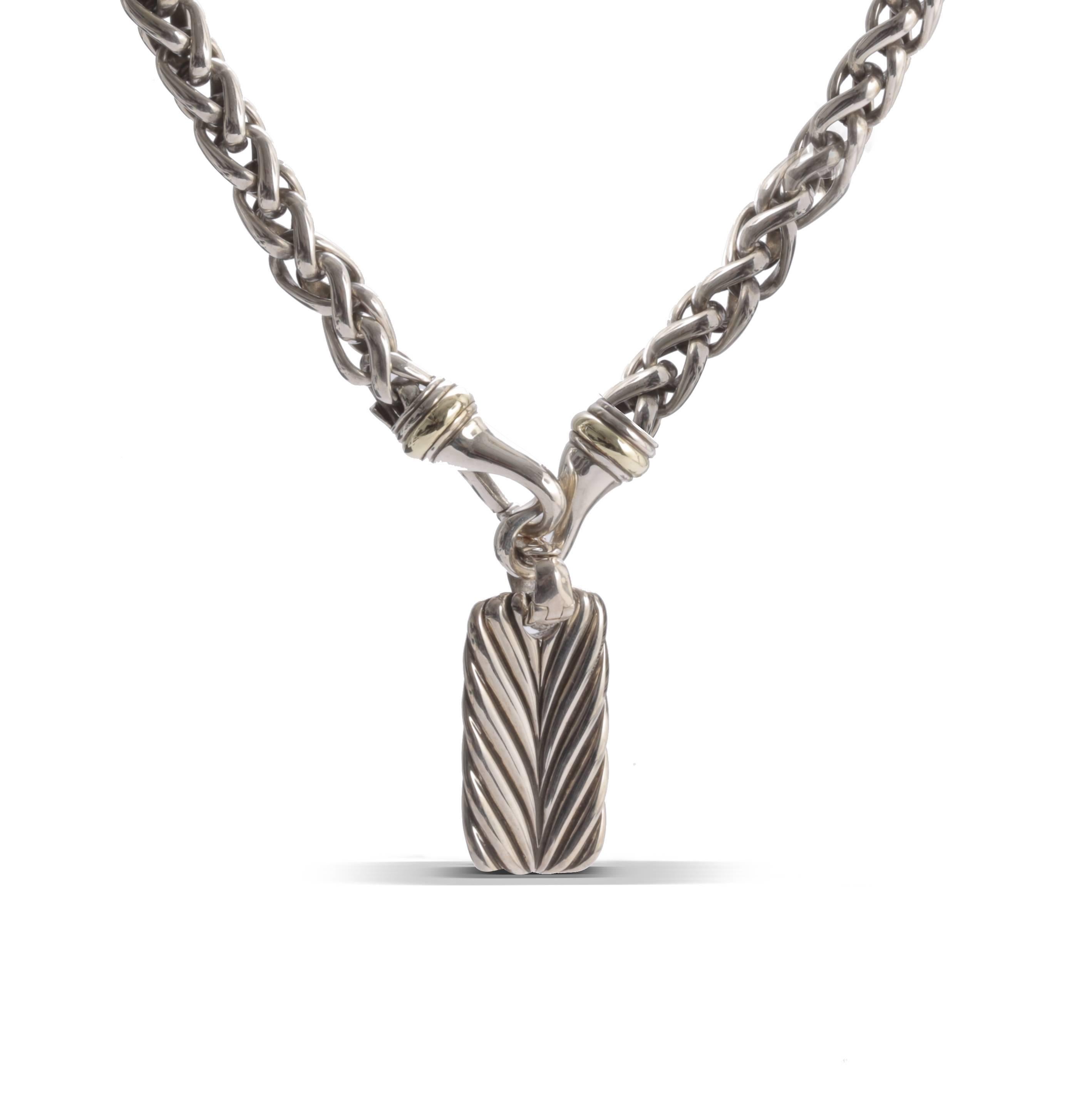 Previously loved sterling silver David Yurman Sculpted Cable dog tag with cable texture throughout with hinged bail (only the dog tag reflected in price).



