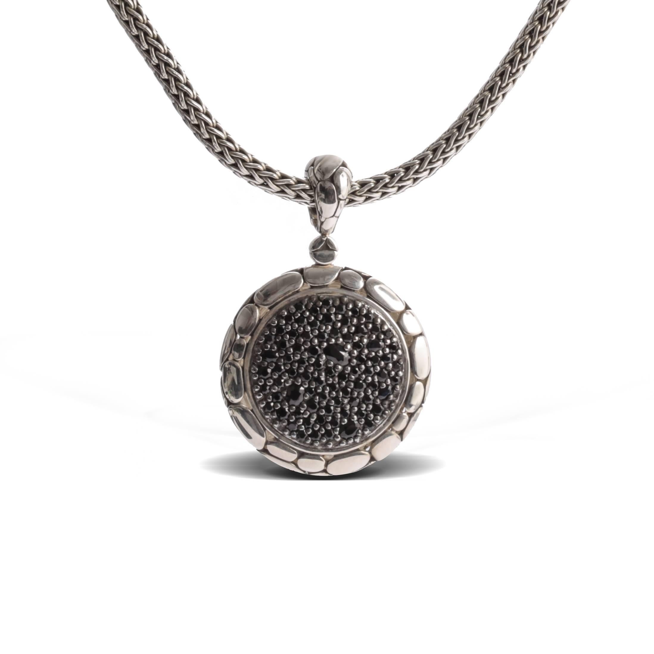 Previously loved sterling silver John Hardy Kali Lava Fire pendant featuring pave black sapphires at center with signature pebbled texture throughout piece and bail with openwork back.

