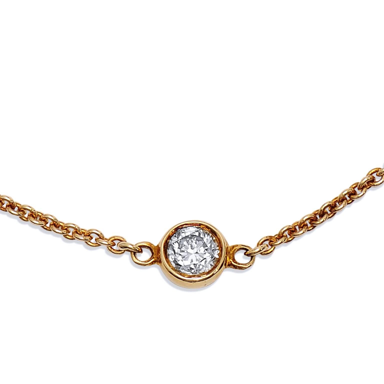 Cute and dainty, this handmade 18 karat yellow gold bracelet features 0.19 carat of diamond bezel set with a lobster clasp (I/J/VS1).