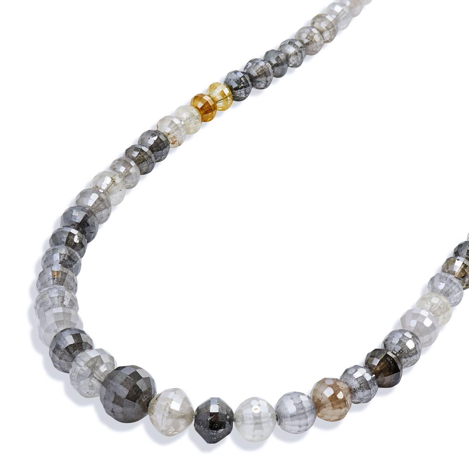 This absolutely stunning diamond necklace is a show stopper!

This necklace has 18 inches of fancy brown, fancy grey and fancy yellow diamond beads with a whopping total of 73.65 carats!

This is a one of kind, handmade piece by H&H that emphasizes