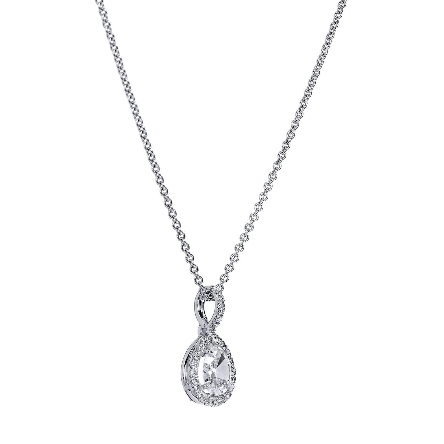 This is a handmade of a kind piece by H&H Jewels.  This pendant features a 0.72 Carat Antique Pear Cut Diamond Pendant 

0.11 carat of round cut diamond (G/H/VS) twinkle like dew drops on leaves- resulting in twenty-seven pieces of diamond cascading