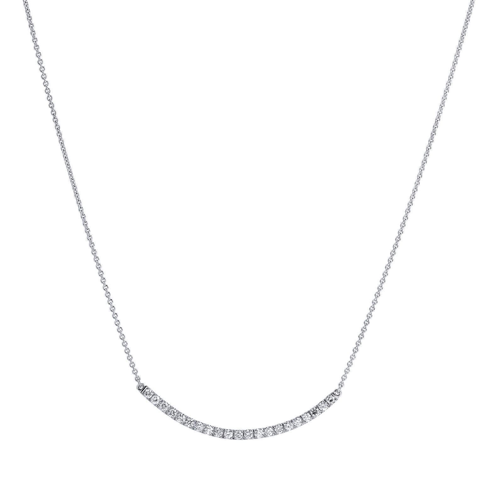 This glittering handmade H and H 18 karat white gold pendant features twenty-one pieces of diamonds, with a total weight of 0.72 carat (E/F/SI1/SI2), set in a four prong setting. This pendant necklace will be a piece that she will cherish.