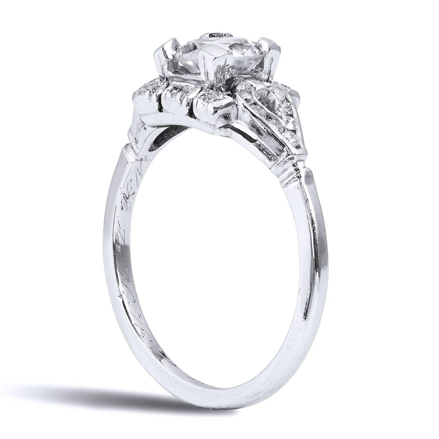 Platinum Art Deco 0.93 Carat Diamond Engagement Ring Size 5.5

This estate ring is absolutely stunning.  It is very ornate and is from the Art Deco era.  The year, 1936 is engraved inside of the ring.  A striking 0.69 carat Old European cut diamond