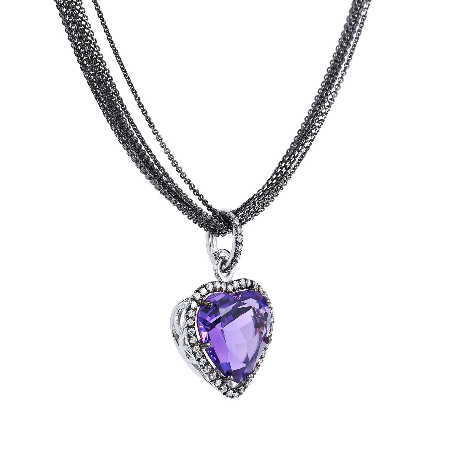 The heart, a symbol of not only deep love and affection but also, the beauty that lies at the core of one’s being. Pave set diamonds, weighing 0.25 carat (G/H/VS), embrace a 6.76 carat heart-shaped amethyst at center gracefully. Amethyst is a