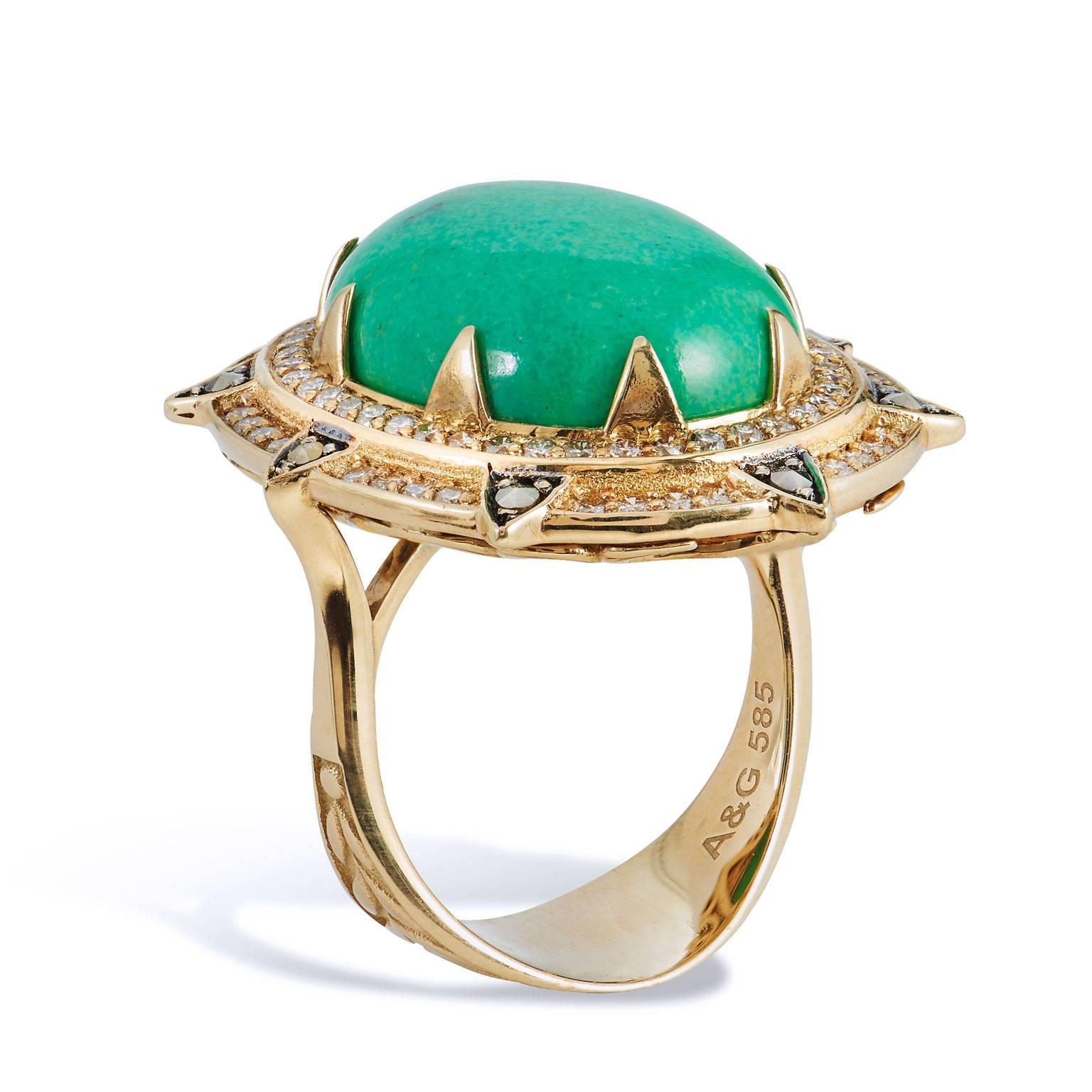 14 karat yellow gold ring featuring a 12.76 carat oval green turquoise measuring 20 millimeter x 15 millimeter. 0.85 carat of brown diamond and 0.18 carat of pyrite further enhance the piece. 