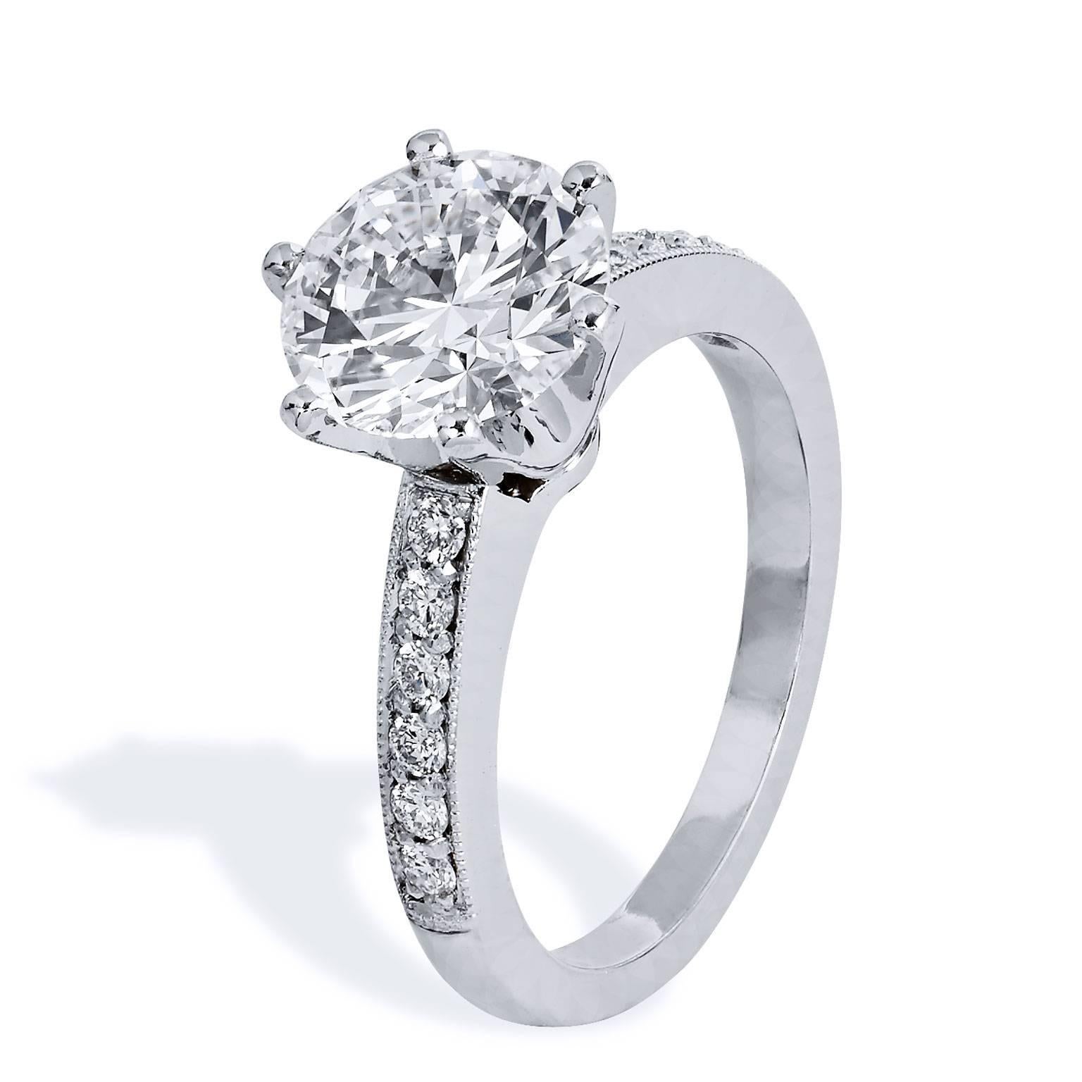 A monumental moment in life is deserving of a monumental ring. This H and H handmade platinum engagement ring features a stunning 2.52 carat GIA certified diamond graded E/WS2 at center, complemented by 0.24 carat of pave set diamond sweeping the